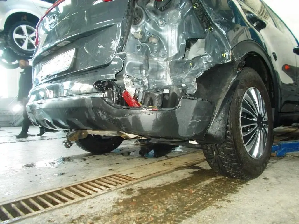 Разрушение заднего бампера и задней правой части кузова Kia Sportage