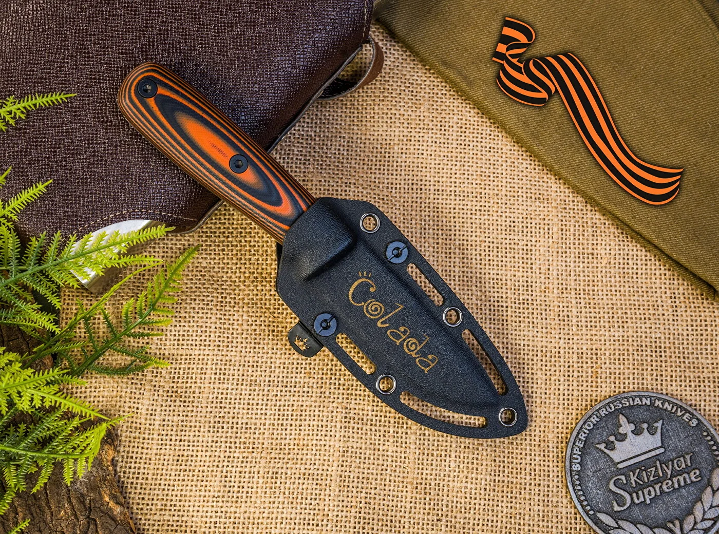Colada fixed blade and leather sheath outdoors
