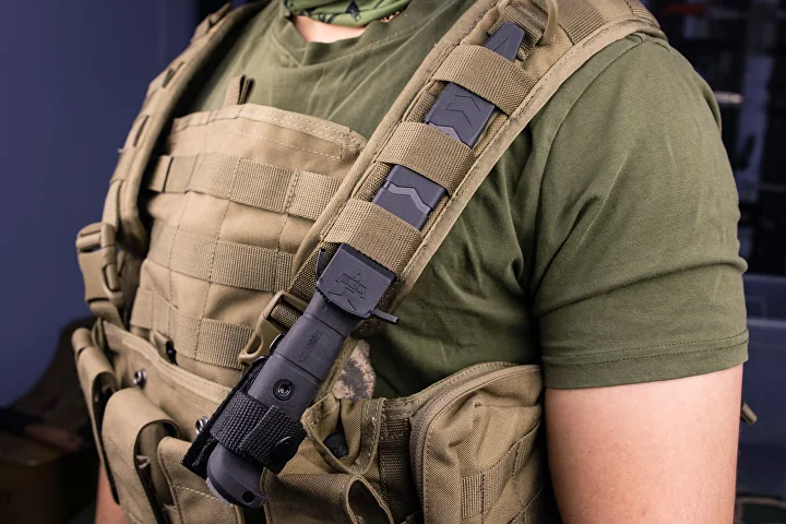 Kizlyar Supreme Vector sheath mounted to tactical webbing