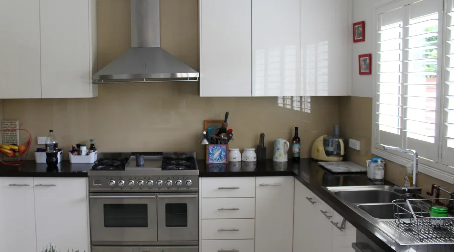 Kitchen before renovation — outdated layout, Renton WA